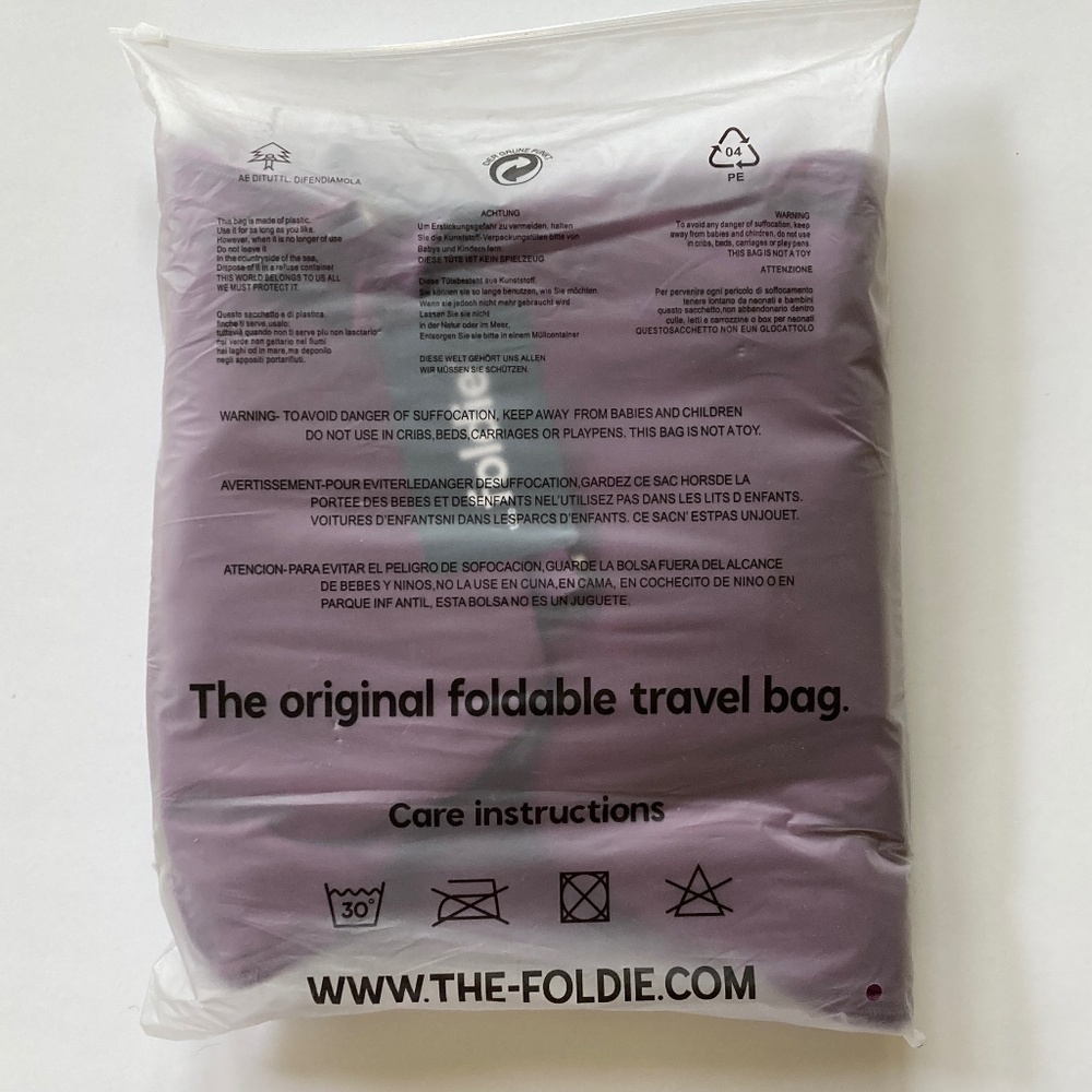 The Foldie 3.0 Expandable Foldable Travel Bag/Fuchsia/NEW IN ORIGINAL PACKAGE!!! - Picture 2 of 3